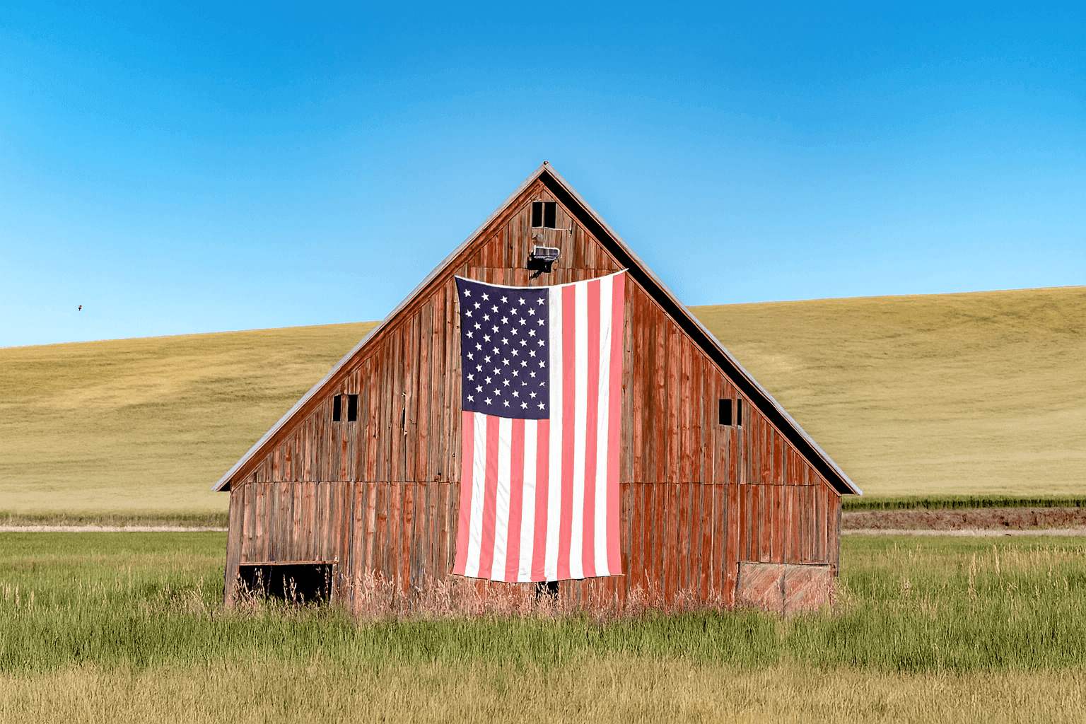 Farm house with American Flag