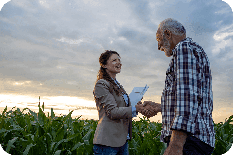 Smiling farmer after closing land purchase deal